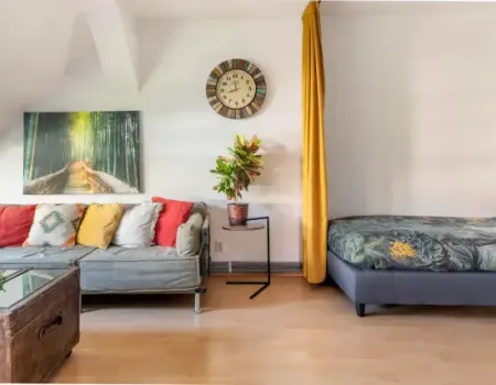 Musikviertel Leipzig - Wohlf&uuml;hl-Oase - G&auml;stezimmer 1 - Wohn-/Schlafbereich